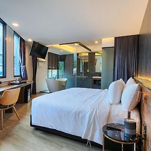 Suite "Grand" met een King Size Bed op de Hoek